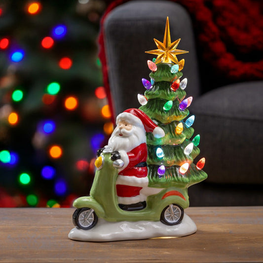 Plow & Hearth Heartfelt Cheer LED Table Décor Resin Santa on Scooter with Christmas