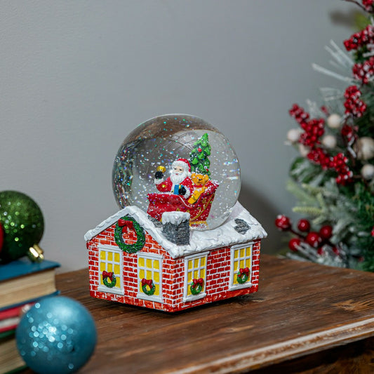Plow & Hearth Heartfelt Cheer Water Globe Resin Santa in Sleigh with House Base, 7.2